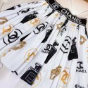 シャネルキッズCHANEL 子供服 白 / 黒 T シャツ + ロゴ柄スカート エレガントコーデセットキッズセットシャネルブランドロゴ、柄スカート2 タイプシャネル半袖 T女の子可愛い