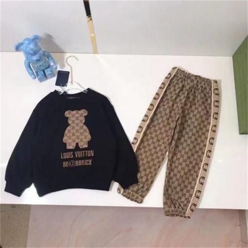 グッチの象徴的なダブル G 柄パンツトレンディなコラボセータールイヴィトン子供服